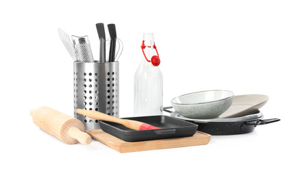 Photo of Set of different cooking utensils and dishes on white background