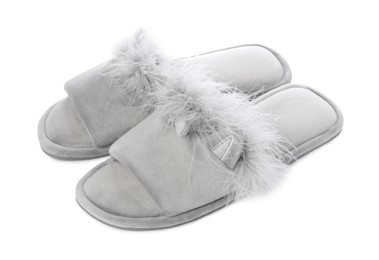 Photo of Pair of soft slippers with fur isolated on white